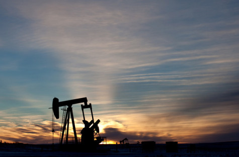 A pumpjack silhouette on the plains in Texas, United States. Additional themes in the image include crude oil, rig, oil industry, gas, natural gas, methane, pipeline, energy sector, economy, earth, environment, pollution, fossil fuel, great plains, and oil field.