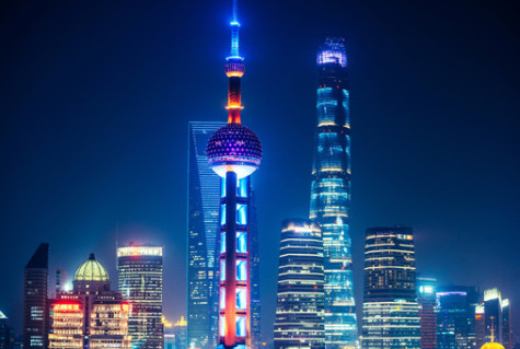 Pudong financial district, with Oriental Pearl Tower and illuminated skyscraper