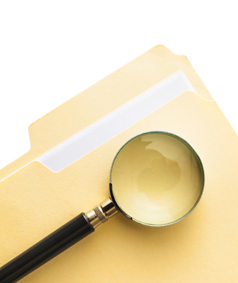 File and Magnifying Glass, Isolated on white, Clipping path