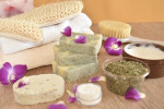 SPA items and orchid. SOAP, massage oils and soft towel