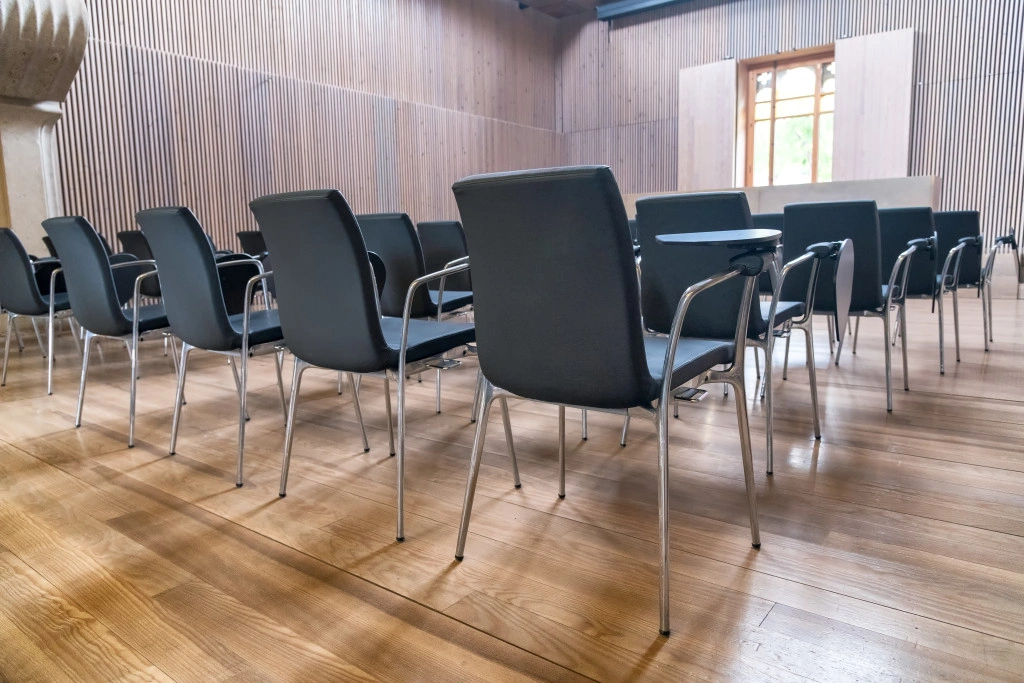 Row of chairs on a modern meeting room.